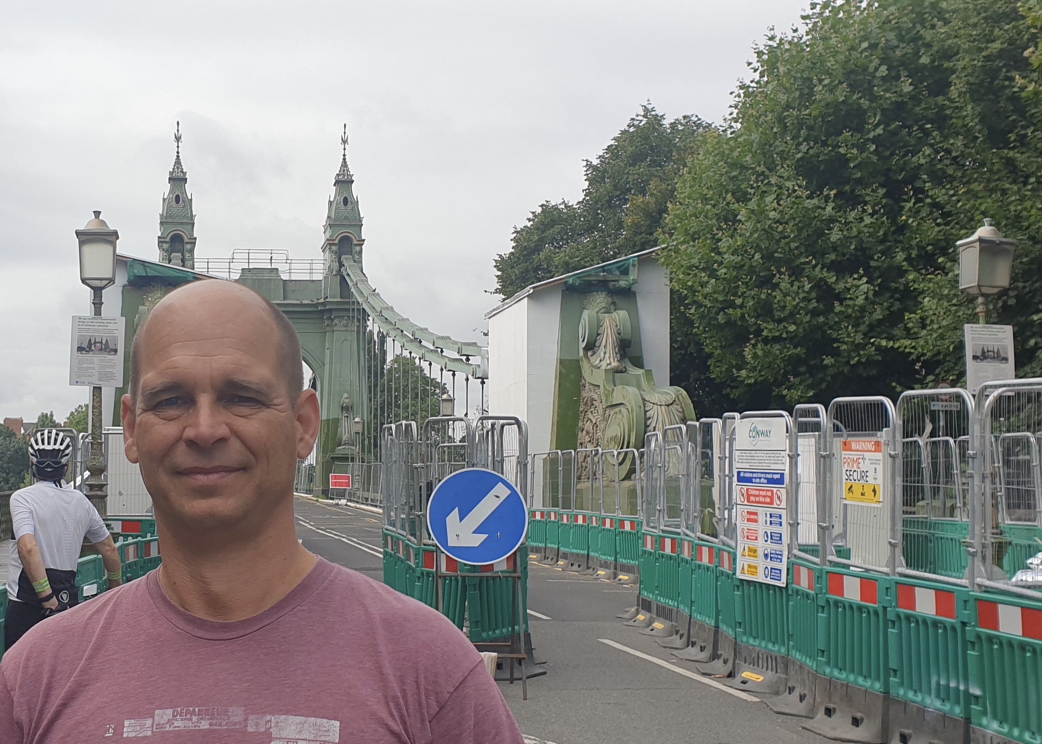 Green Party community campaigner Fabian Frenzel standing in front of the newly-opened bridge